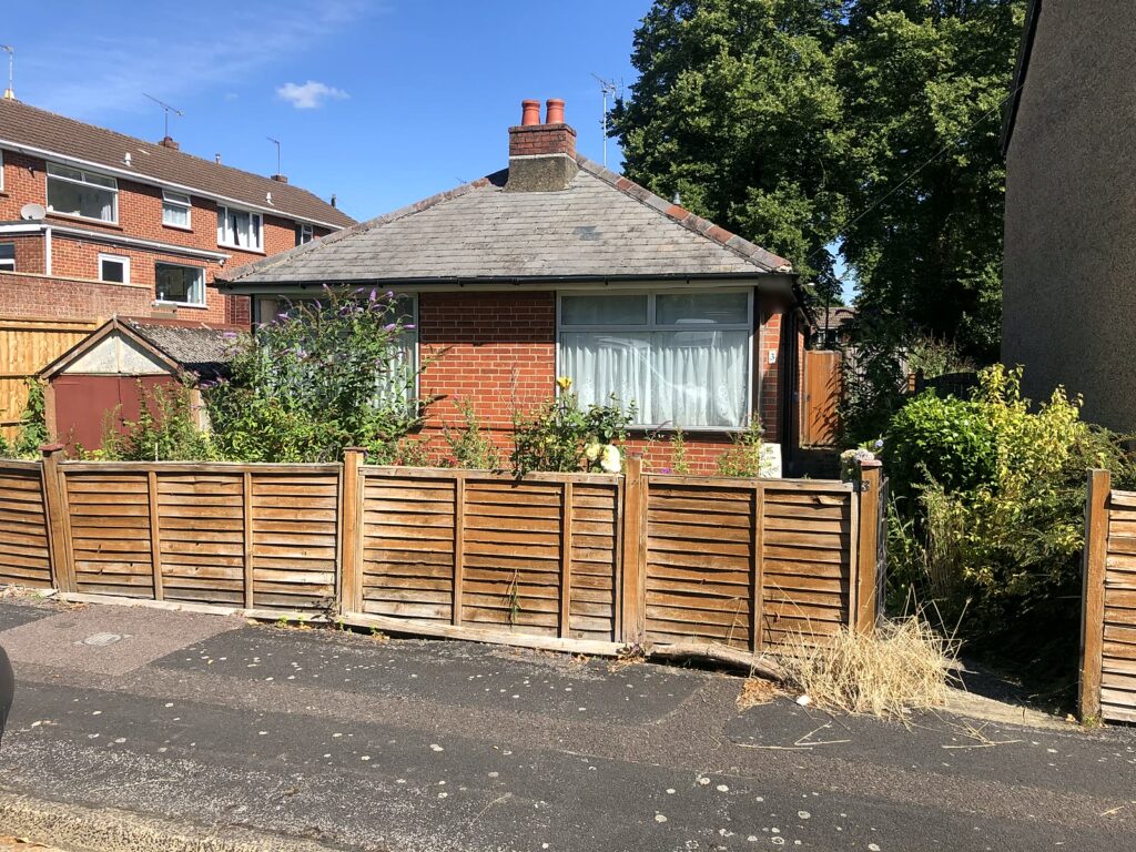 Project story: from old bungalow to two new family homes in Eastleigh The old bungalow on the plot in Eastleigh before work started
