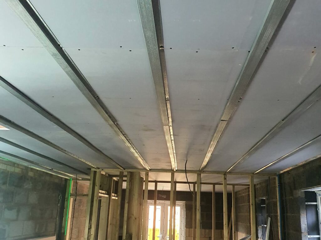 Project story: four new flats in Hampshire, from groundworks to handover Partition walls framed and ceilings boarded