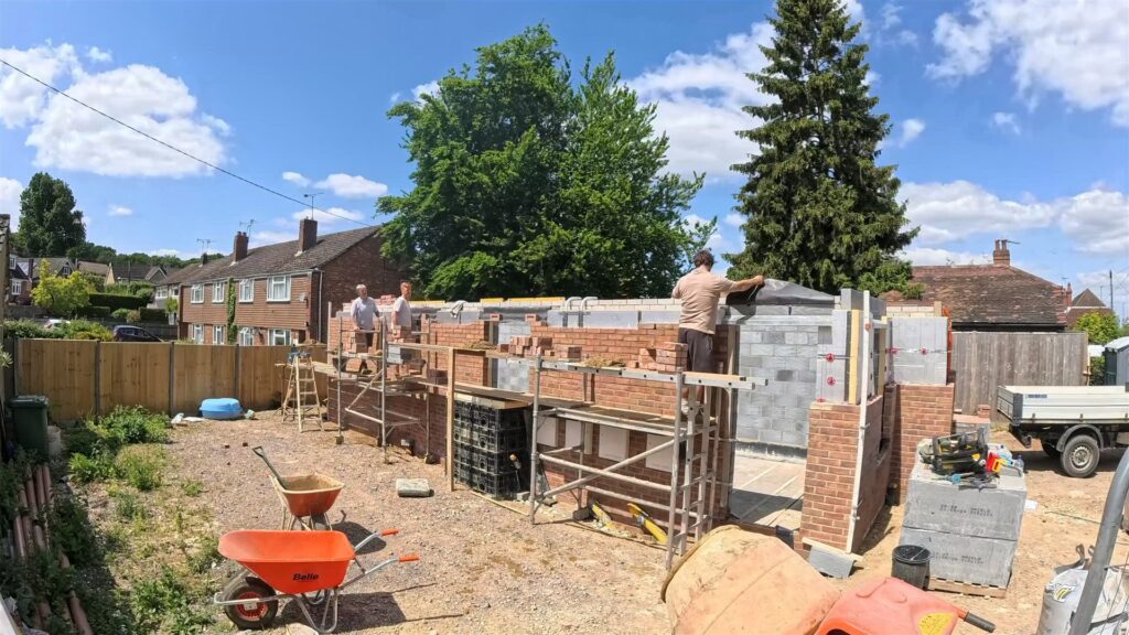 Project story: four new flats in Hampshire, from groundworks to handover Ground-floor walls rising with window openings formed