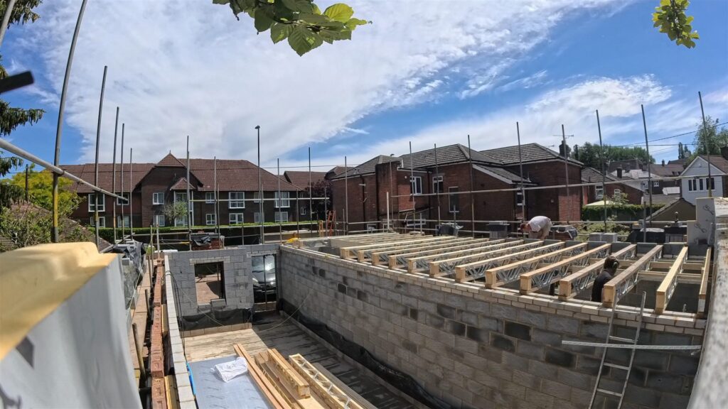 Project story: four new flats in Hampshire, from groundworks to handover First-floor joists in place