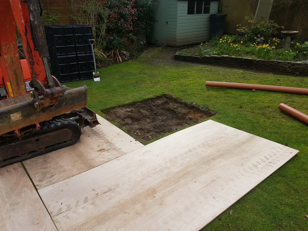 Marking out the new extension on the lawn