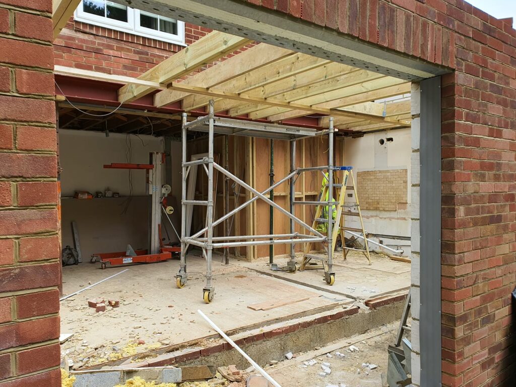 Roof joists in place over the new space