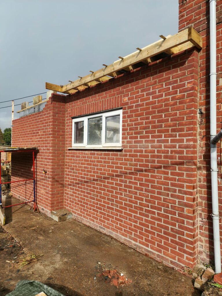 Project story: renovating a tired house, from extension rebuild to finished home New roof joists in place