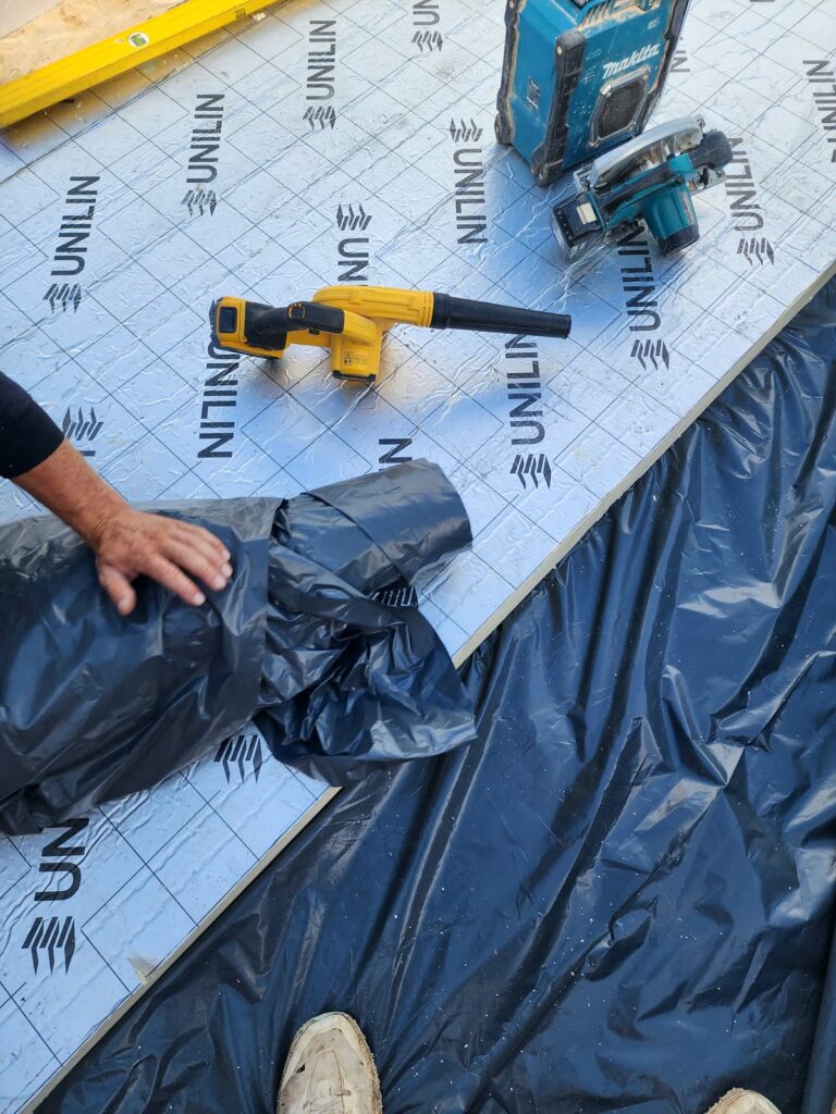Project story: renovating a tired house, from extension rebuild to finished home Insulation boards going down