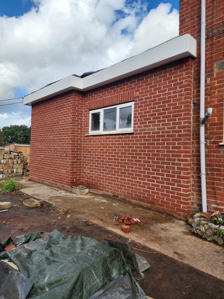 Project story: renovating a tired house, from extension rebuild to finished home The finished extension from the side