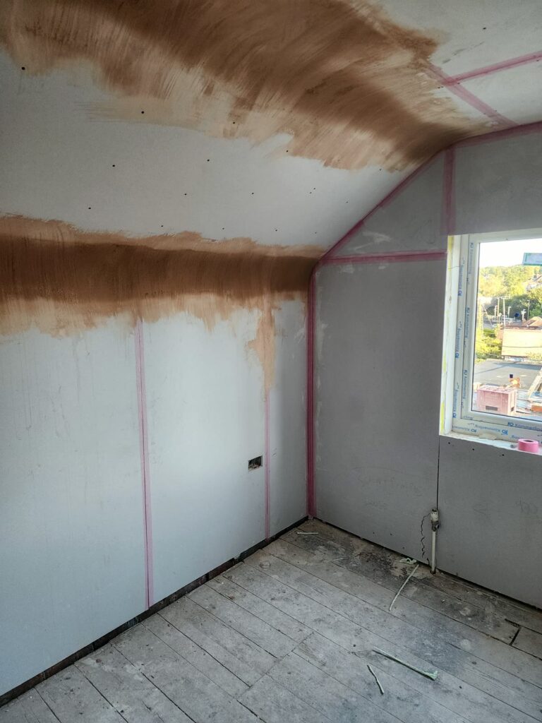 Project story: renovating a tired house, from extension rebuild to finished home Boarded and ready for plaster