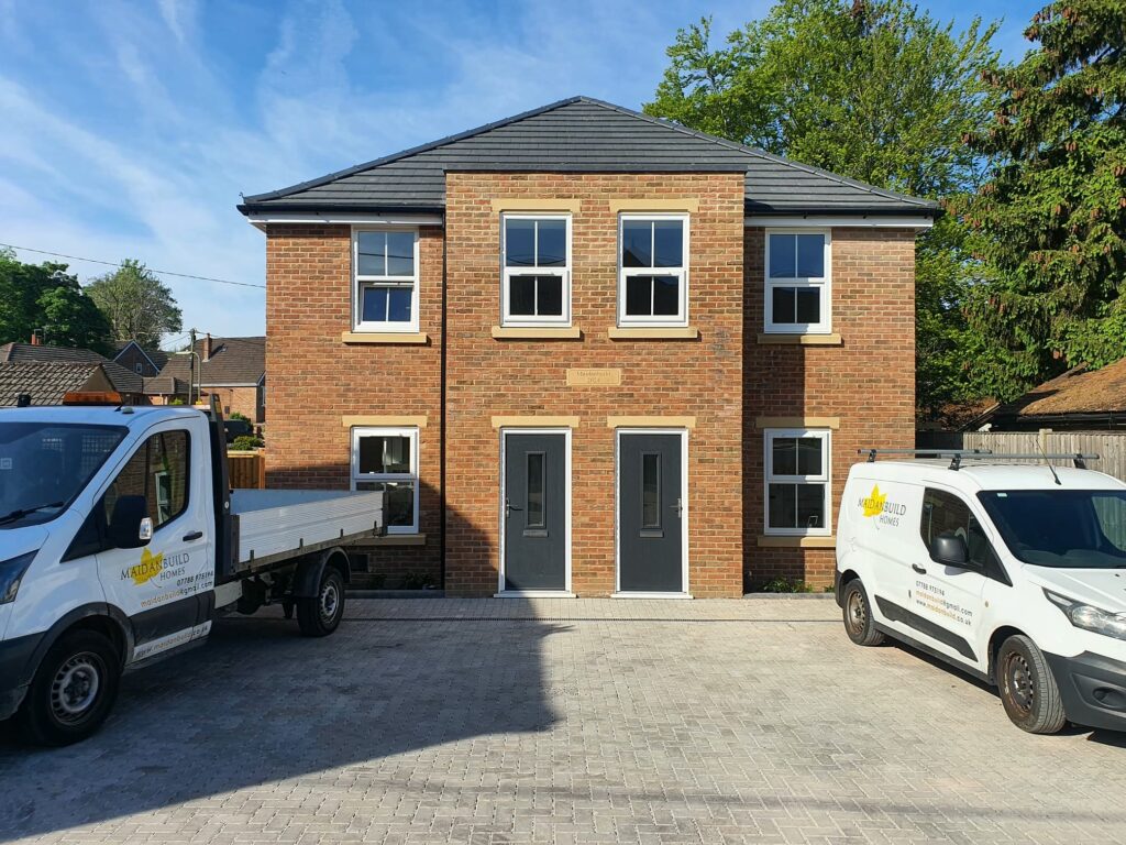 Project story: four new flats in Hampshire, from groundworks to handover The finished building, with our vans outside