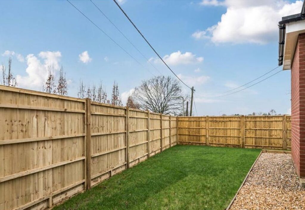 Project story: renovating a tired house, from extension rebuild to finished home The new lawn and fencing