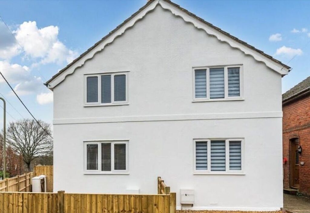 Project story: renovating a tired house, from extension rebuild to finished home The finished house, freshly rendered